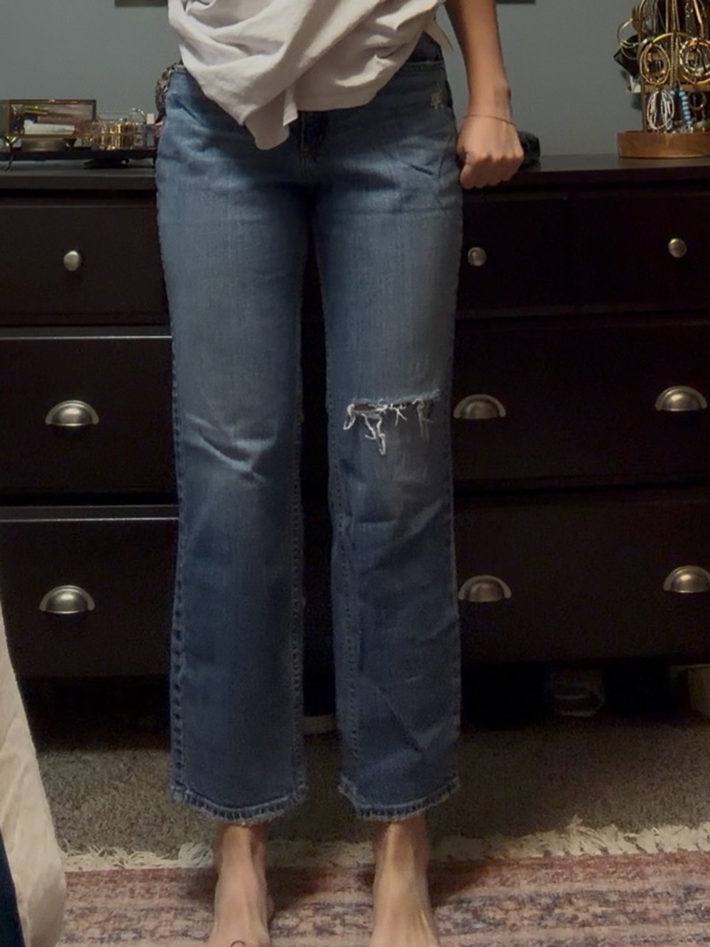 Silver Jeans Women’s Light Blue Flare Jeans with Distressed Knee